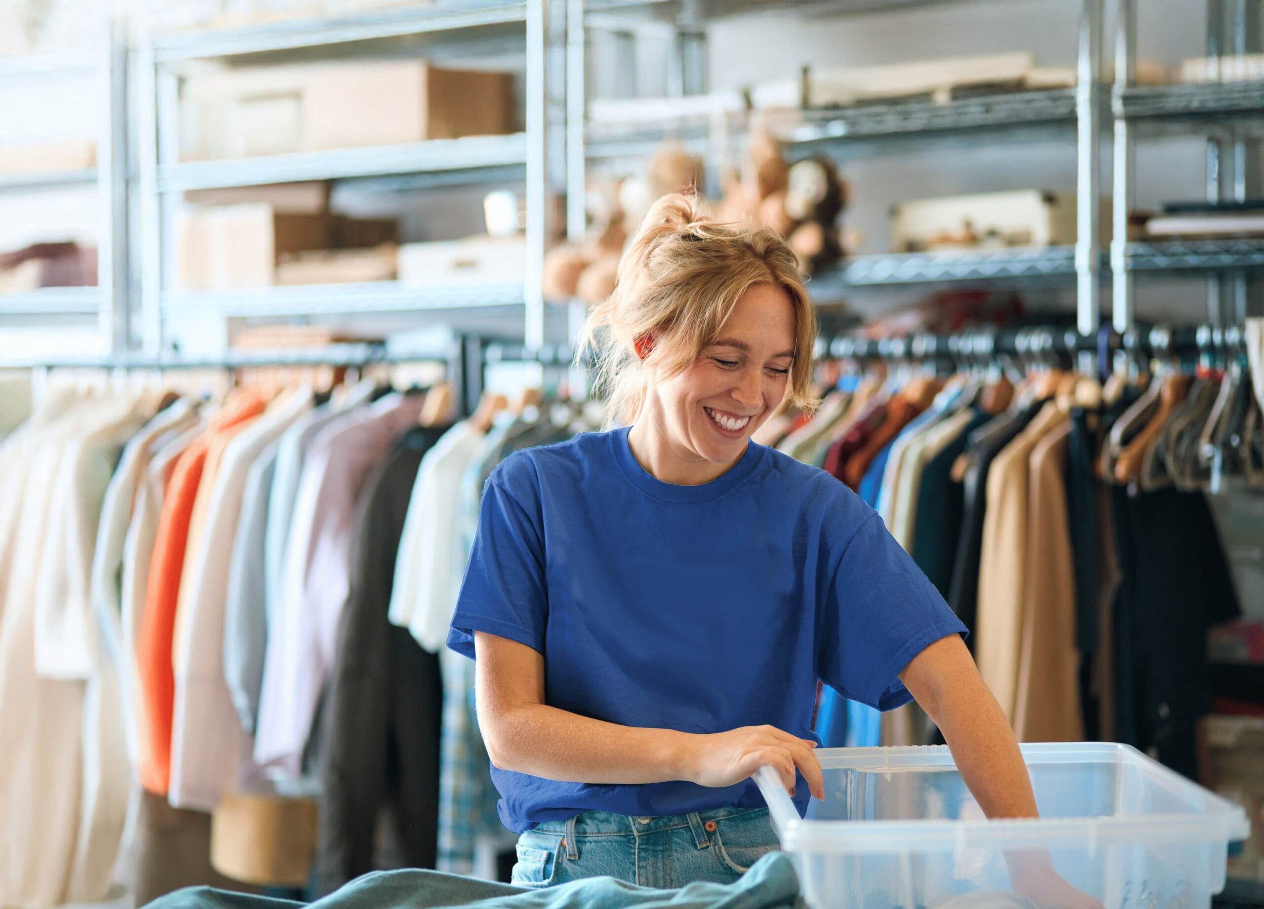 Volunteer helps at donation station small