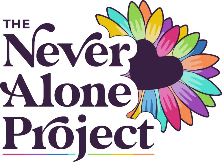 Logo for The Never Alone Project, featuring large dark text and a colourful, heart-shaped design made of multicoloured feathers or petals on the right side. A thin rainbow line appears underneath the text.